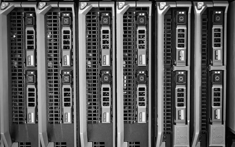 Rows of illuminated server blades in a data centre