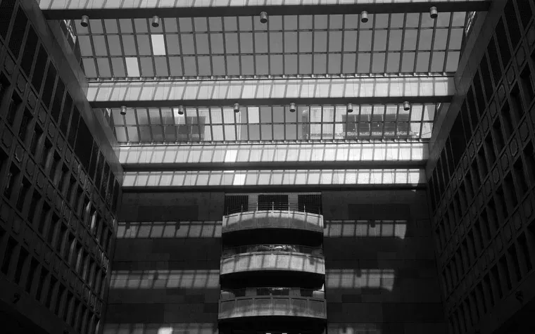 Glazed atrium roof above a concrete interior