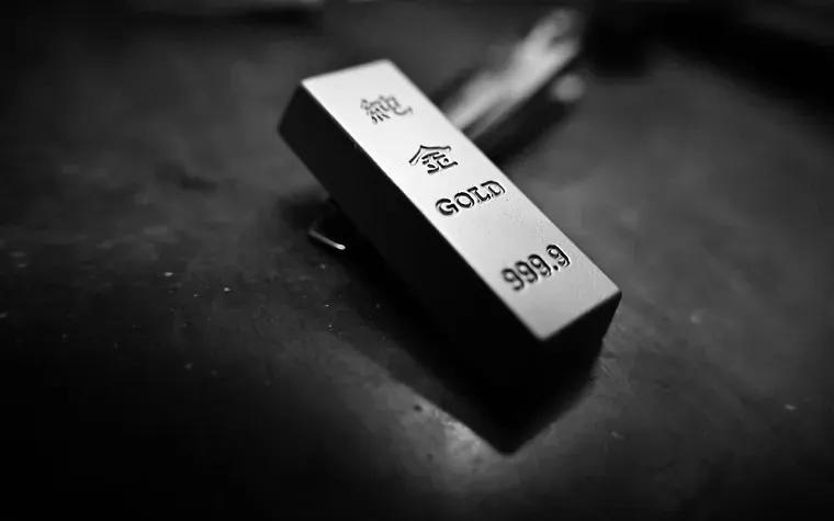 A single bullion bar under directional light