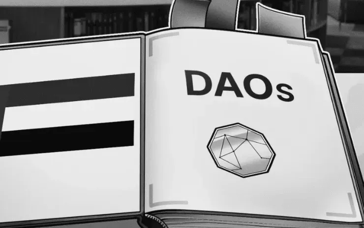 Open book titled DAOs beside the UAE flag in a library