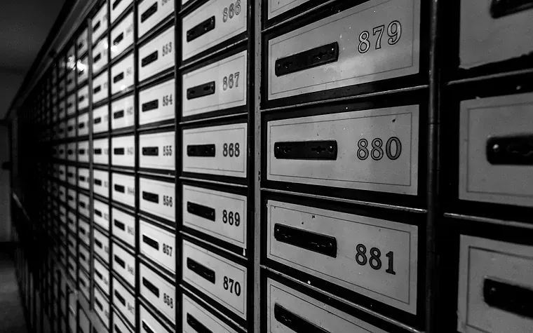 Wall of small numbered locked boxes